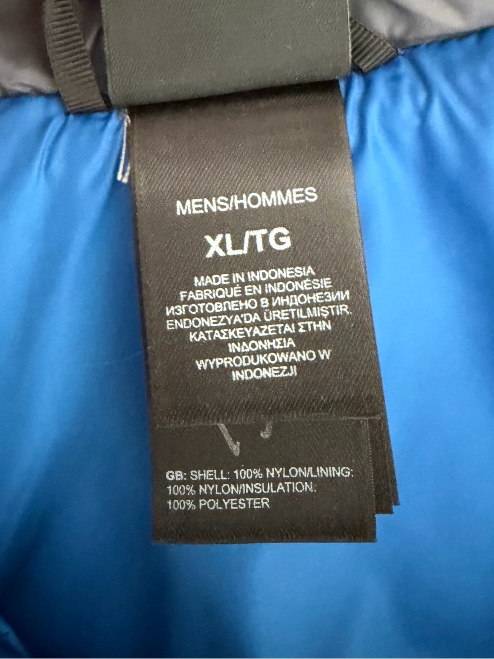 The North Face Men's Dark Gray Puffer Vest with Blue Accents - Picture 4 of 5